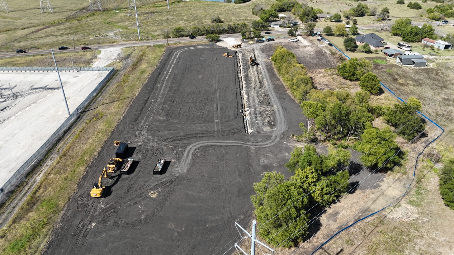 Smith BESS Facility Site Clearing · Earthworks · Grading · Drainage · Water/Sewer/Storm/Fireline · Dry Bores · Conduit · Grounding · Trenwa · Concrete Paving · Landscaping · Substation Infrastructure in Royse City, TX — photo 3