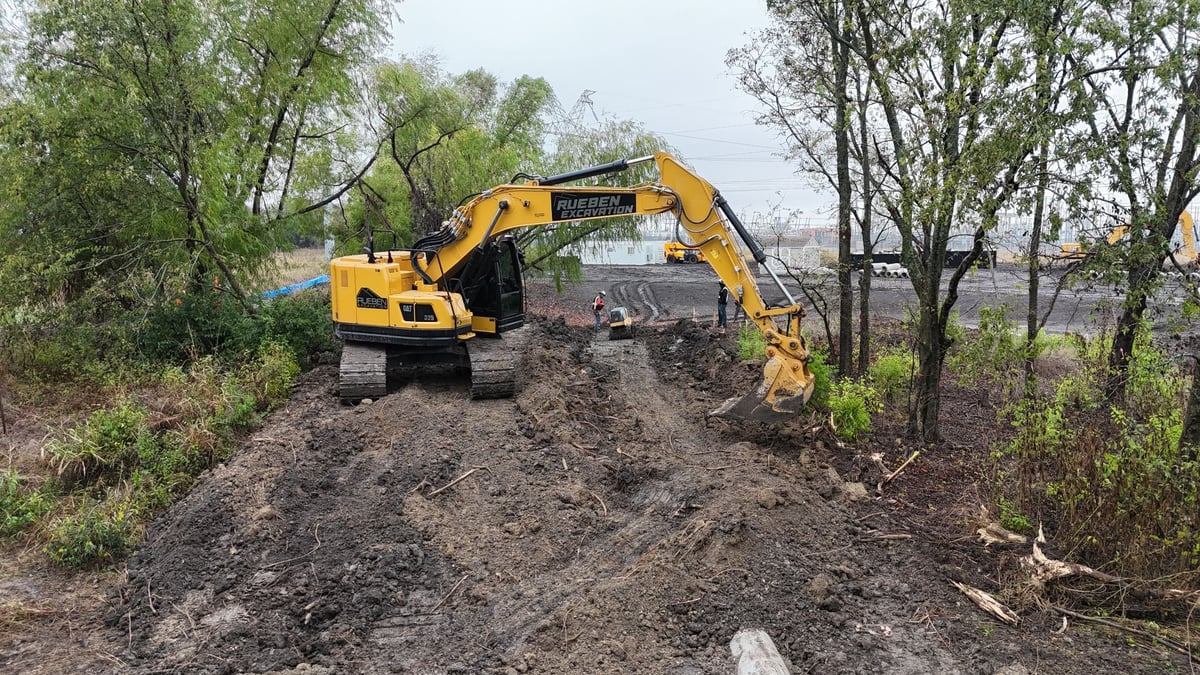 Rueben Excavation CAT 325 clearing access at substation site